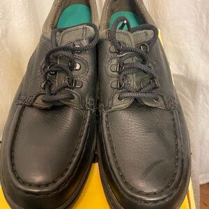 Stylish Black Steel toed shoes. Crafted for durability and comfort.